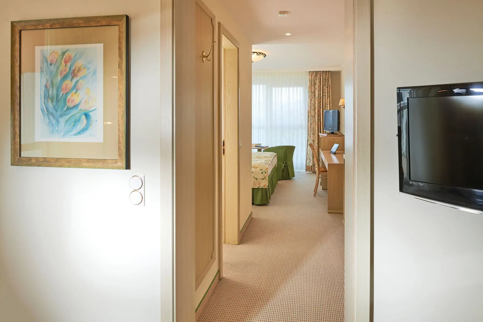 Suite Nordperd & Villa's Hal met tv en tafel